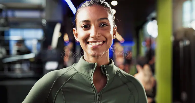 portrait healthy woman smile gym confident commitment to training routine workout happy athlete indian person pride 383735868